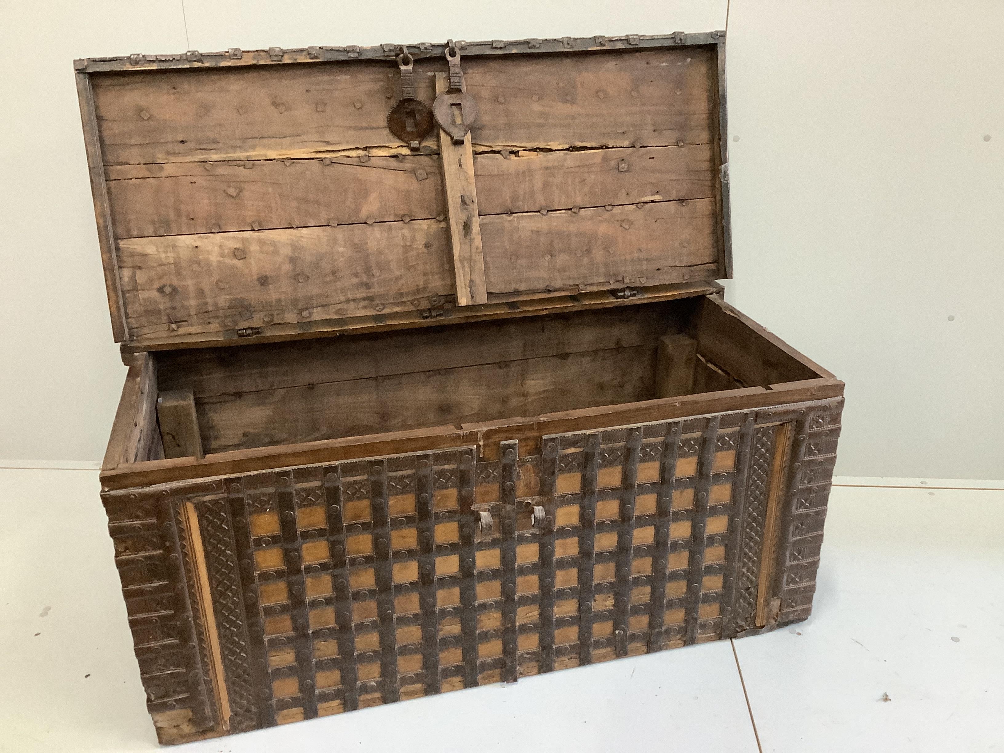 A 19th century iron bound hardwood trunk, width 131cm, depth 66cm, height 59cm